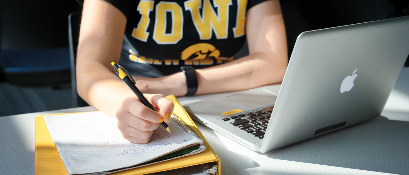 Writing in notebook