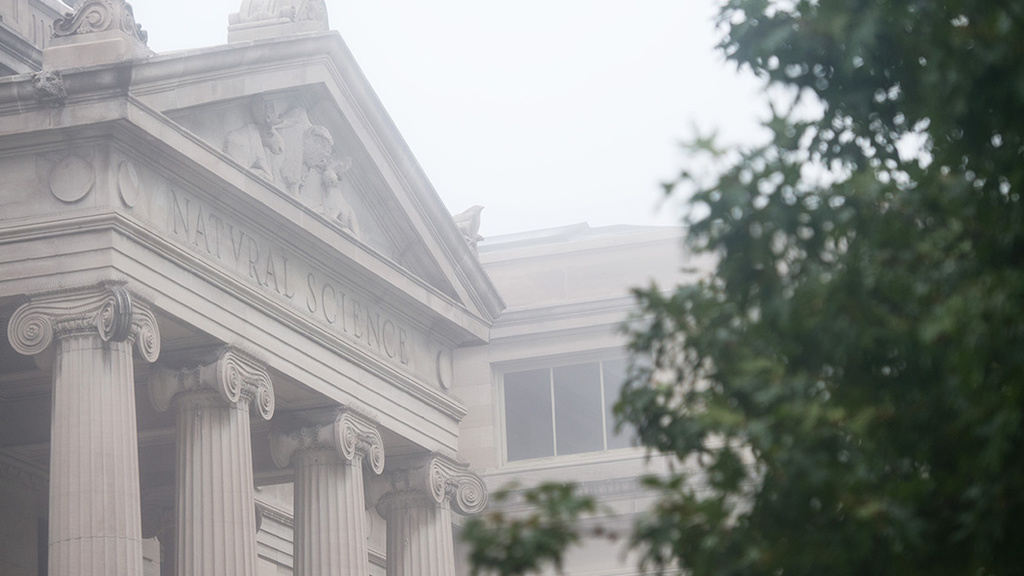 natural science building on a foggy morning.
