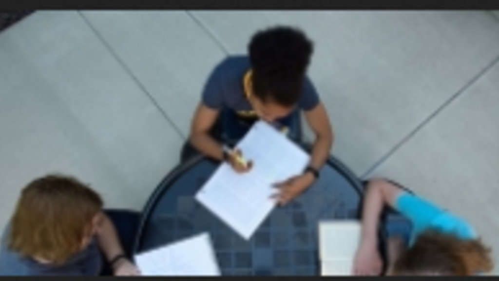 3 students studying