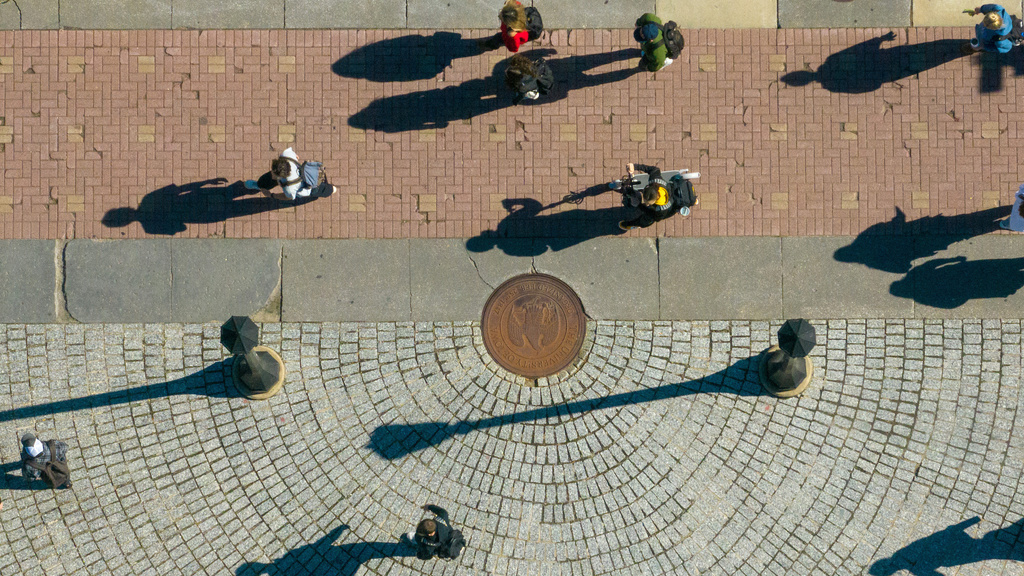 drone image of people walking on Pentacrest