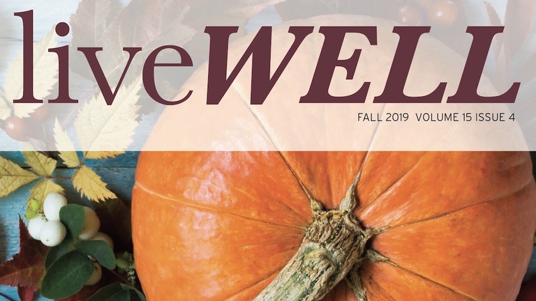 Newsletter cover reading liveWELL with a photo of pumpkin in the background.